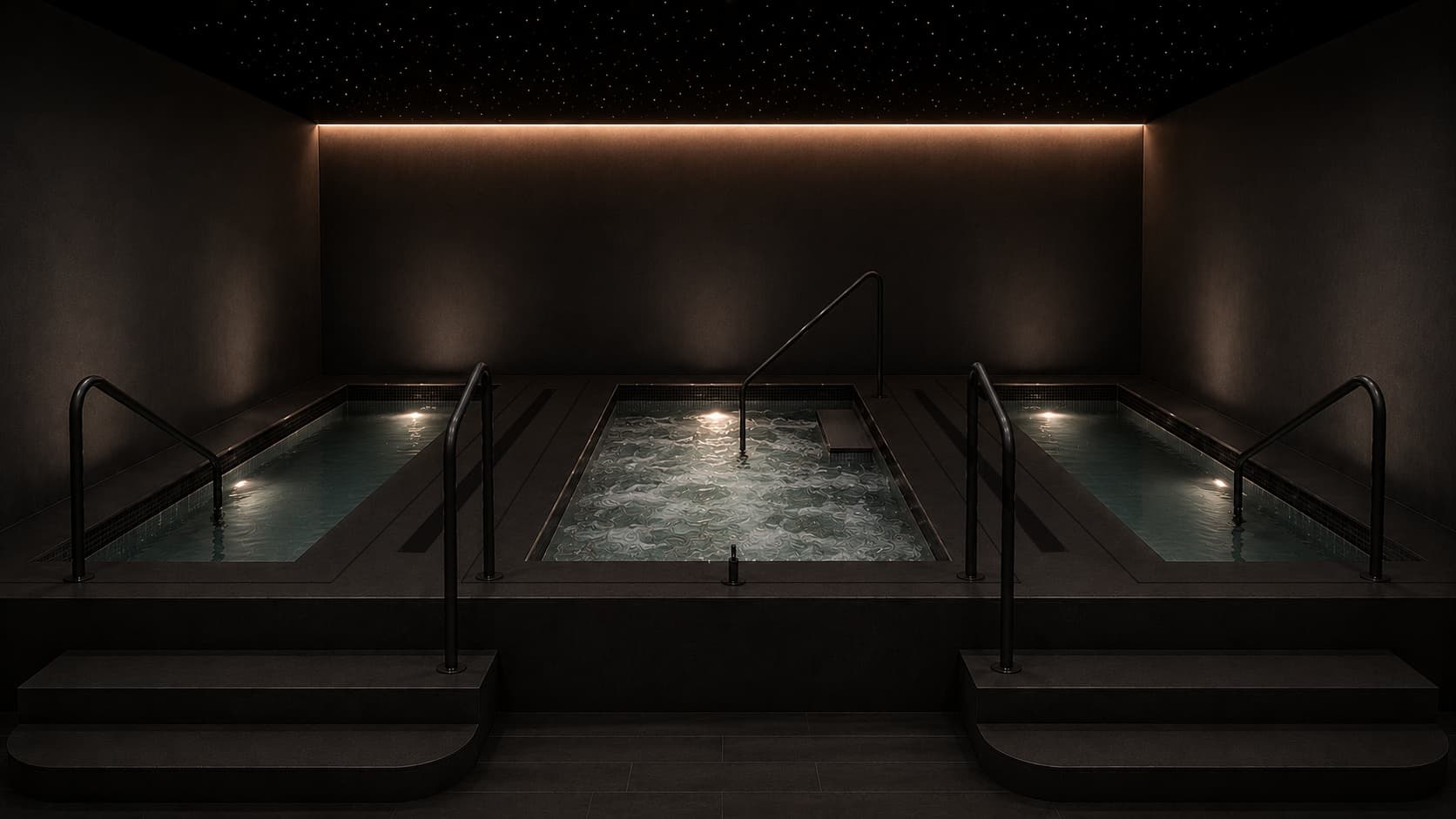 Two cold plunge pools flanking a hot tub under a fibre-optic star ceiling in the contrast suite at Composure Club